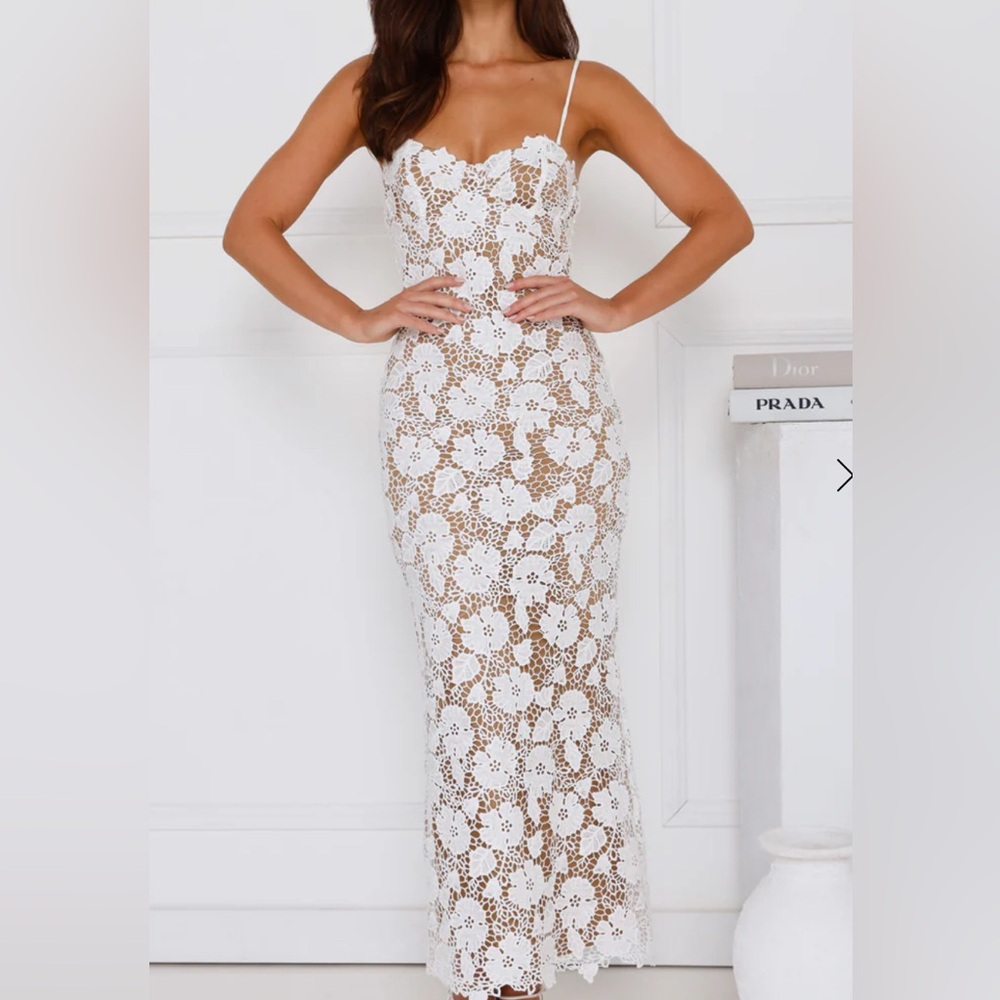 Unworn white lace corset dress.